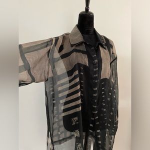 Elegant Maude Andrade tonic top. Large